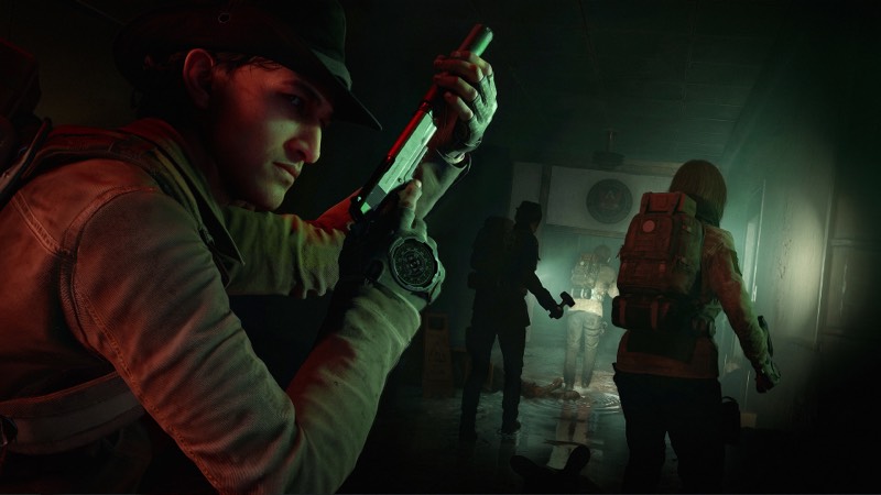 Squad moving together through a dark corridor